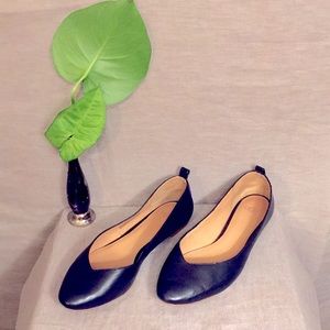 Understated UGG black leather flats, US 8.5
